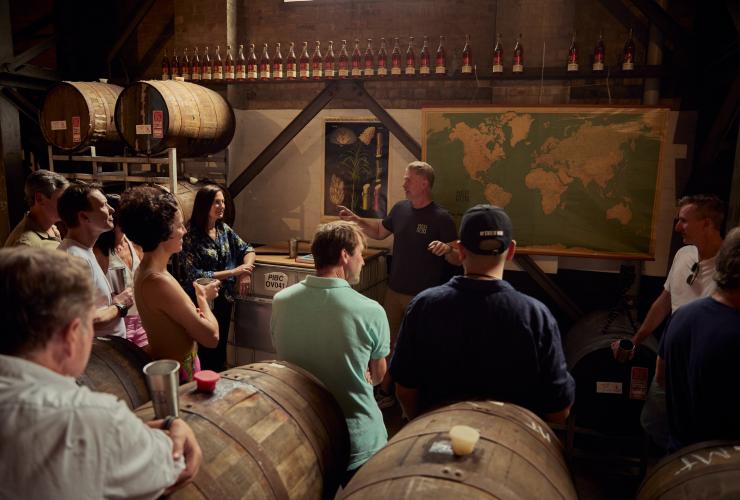 The guided tour in the barrel hall at Red Mill Rum Distillery © Red Mill Rum Distillery