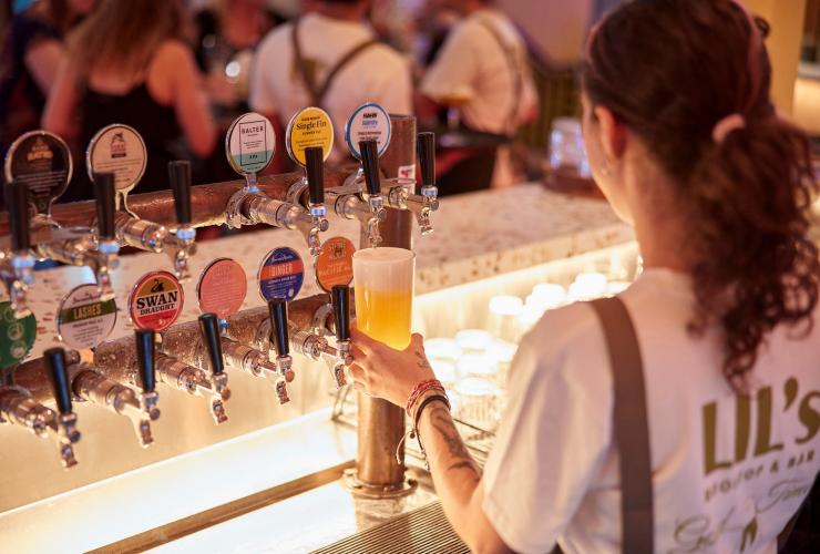 An insiders view of the beers and ales on tap at Lil’s Rooftop & Bar. © Shot by Thom