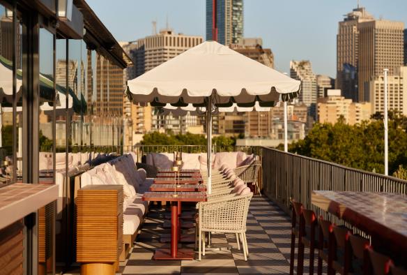 The long table and chairs at the city end of the rooftop terrace at Monica. © Steven Woodburn