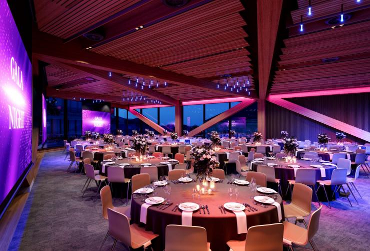 A render of the pillarless event space at night © The Tasman