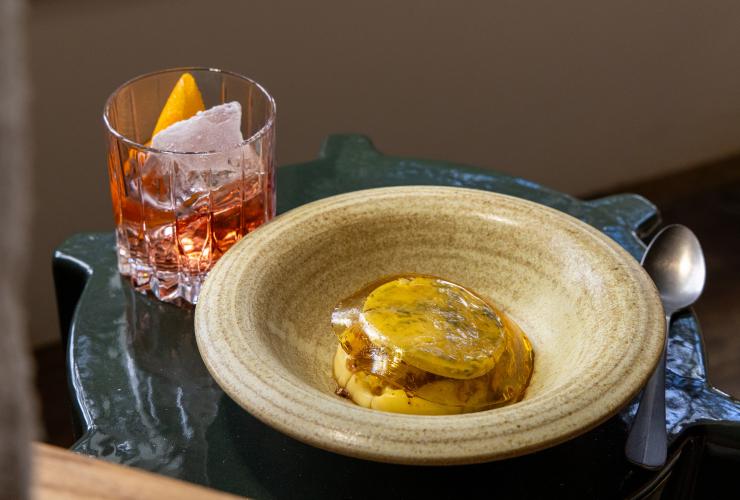 A plated dish of long paddock banksia and bluestone cheeses, mead, honey and hazelnuts from the Harvest Menu © Kitti Gould