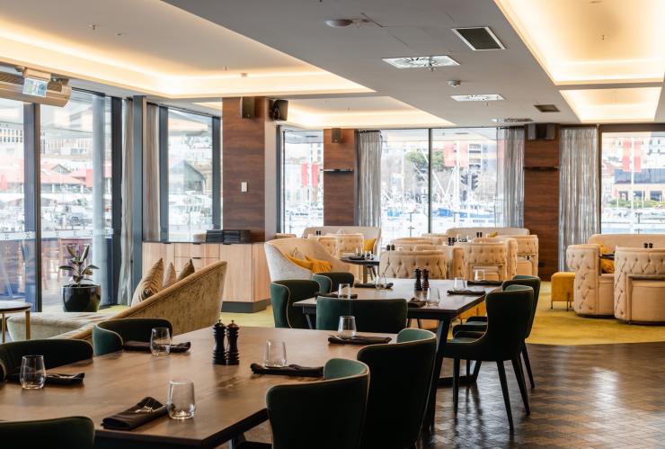 The restaurant with plush seating and tables © MACq01