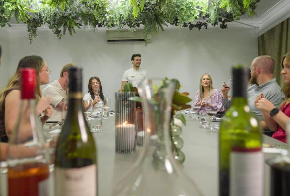 Pierre from Stay n’ Sip hosts a wine tasting for a business event. © Stay n’ Sip
