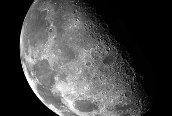 A clear telescopic photo of the moon shows its colour and craters in great detail © Blue Mountains Stargazing
