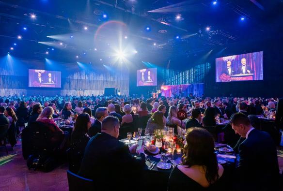 A full ballroom is the stage for a gala event with banquet tables full of guests. © Nyaal Banyul Geelong Convention and Event Centre 