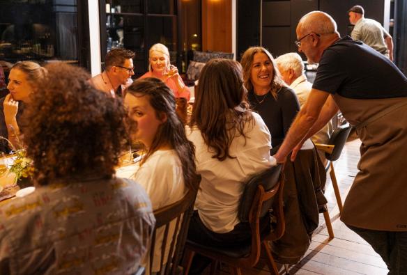 Ivano Del Pio, cook and owner of Hobart restaurant Scarpetta, makes the rounds, chatting with guests. © Andrew Wilson Photography